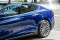 Tesla Model S 90D electric supercar parked in city