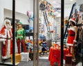 Christmas-themed costumes worn by mannequins