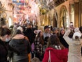 Friends family pedestrians tourists taking group photo with Christmas Market