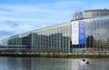 Telephoto view of European parliament with 70 years of European democracy in