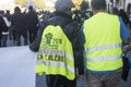 Yellow vest people protesting against the sanitary pass with text in french : citoyen en colere, in english : angry citizen