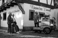 Portrait of man playing with a barrel organ in the street