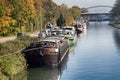 Abundance of moored houseboats residential barges