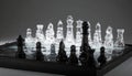 Strategic Confrontation on a Glass Chessboard Royalty Free Stock Photo