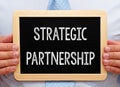 Strategic Partnership - Businessman with chalkboard