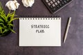 Strategic plan text on note pad Royalty Free Stock Photo