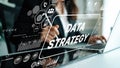 Strategic Planning for Data Management with Graphical Elements and Business Insights in a Modern Office Environment Royalty Free Stock Photo