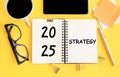 Strategic Planning Session for Business Growth in 2025 With Notepad and Coffee Royalty Free Stock Photo