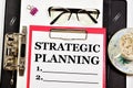 Strategic planning. A text label in a working notebook.