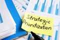 Strategic Prioritization. Documents and folder with papers Royalty Free Stock Photo