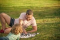 strategic and tactic. tutorship. dad and boy play logic game. father and son playing chess