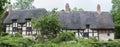 Anne Hathaway`s William Shakespeare`s wife famous thatched cottage and garden at Shottery, just outside Stratford upon Avon, En Royalty Free Stock Photo