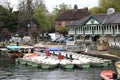 Rowing boats on The River Avon with The Boat House Restaurant and The Swans Nest Hotel behind. Royalty Free Stock Photo