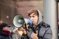 STRATFORD, LONDON, ENGLAND- 5 December 2020: Anti-lockdown Standupx protester making a speech at a protest in Stratford