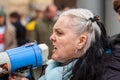 STRATFORD, LONDON, ENGLAND- 5 December 2020: Anti-lockdown Standupx protester making a speech at a protest in Stratford