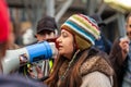 STRATFORD, LONDON, ENGLAND- 5 December 2020: Anti-lockdown Standupx protester making a speech at a protest in Stratford