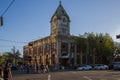 Strathcona Public Building - an old brick house with a tower and clock. Old post office. Amazing sunset, sun rays, clear sky.