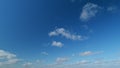 Stratocumulus clouds against a blue sky. Natural beautiful scene. Purity and serenity concepts. Timelapse.