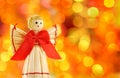 Straw angel on the background lights defocus Royalty Free Stock Photo