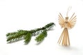 Straw angel with spruce branch Royalty Free Stock Photo