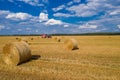 Straw bales on the field against the blue sky. Harvest Royalty Free Stock Photo