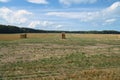 Straw bales on a harvested wheat field. Food supply. Agriculture to feed humanity Royalty Free Stock Photo