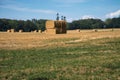 Straw bales on a harvested wheat field. Food supply. Agriculture to feed humanity Royalty Free Stock Photo