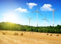 Straw bales with wind turbines
