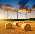 Straw bales with wind turbines