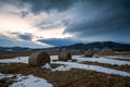 Straw bales on winter field. Royalty Free Stock Photo