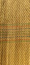 Straw bedding, tablecloth or small rug laid on the table. Top view straight. Straw texture with thread weaves. Top view Royalty Free Stock Photo