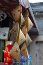 Straw conical hats for sale at a shophouse Royalty Free Stock Photo