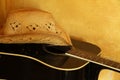 Straw Cowboy Hat on Guitar