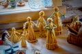 Straw doll. Vintage children`s toys handmade from dried straw Royalty Free Stock Photo