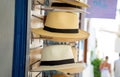 Straw handmade multicolor hats on outdoors stand, at Greek island souvenir street shop Royalty Free Stock Photo