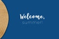 Straw hat detail on the classic blue background with Welcome, summer wording