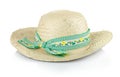 A straw hat with a green ribbon