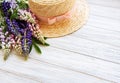 Straw hat and lupine flowers Royalty Free Stock Photo