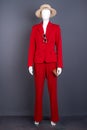 Straw hat and red formal suit. Royalty Free Stock Photo