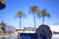 Straw hat, sun glasses on the lounger, near pool.