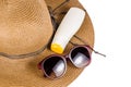 Straw hat with sunglasses and sun lotion Royalty Free Stock Photo