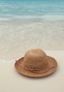 Straw hat on tropical island Royalty Free Stock Photo