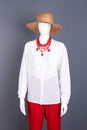 Straw hat, white blouse and necklace. Royalty Free Stock Photo