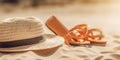 Straw hat and women orange sandals on the sand. Beach vacation concept background. Created with generative Ai