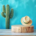 Straw hat on wooden podium with cactus on blue background. Royalty Free Stock Photo