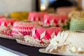 Straw hats for sale in a tropical souvenir shop in Aitutaki, Cook Islands. With selective focus