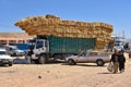 Straw hay bales truck in Morocco animal market Royalty Free Stock Photo