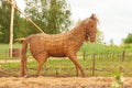 Straw horse, garden sculpture in a farm with straw farmr