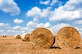 Straw sheaves on the field Royalty Free Stock Photo