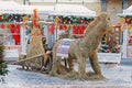 Straw Shrovetide doll and horse at Russian national festival `Shrove` on Revolution square in Moscow